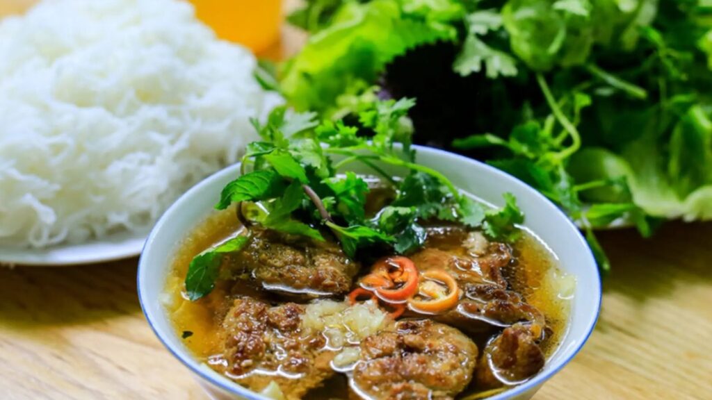 try bun cha hanoi in vietnam