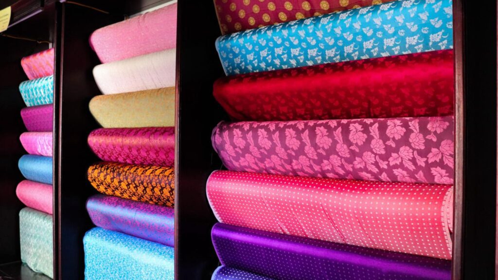 buying silk souvenirs from Vietnam